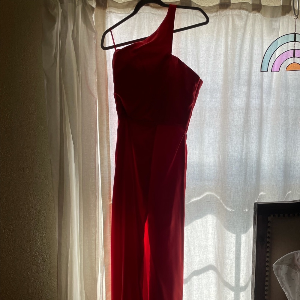 New. Red long formal asymmetrical dress with side slit.